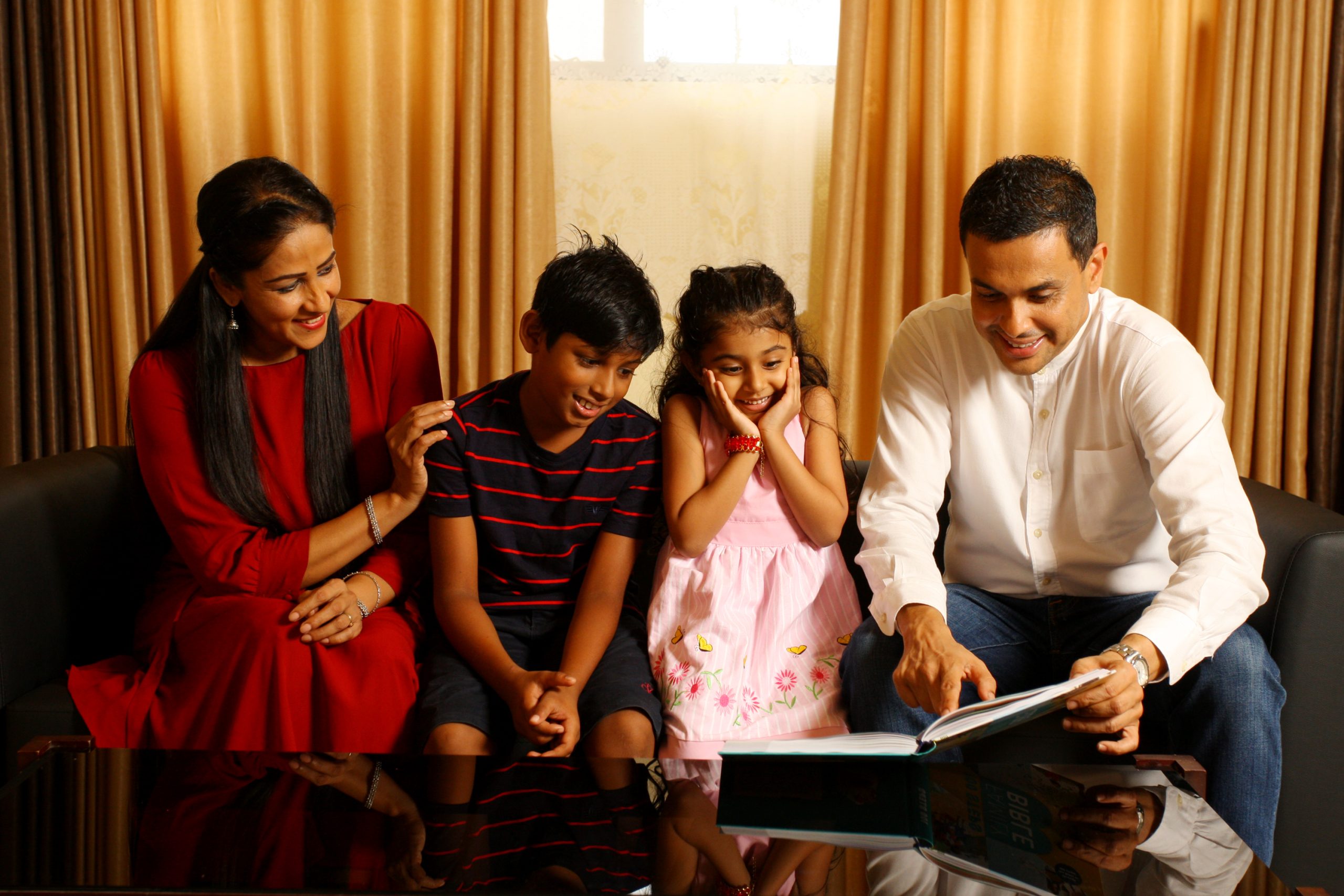 A family in Sri Lanka reading the Family Bible 100 Steps